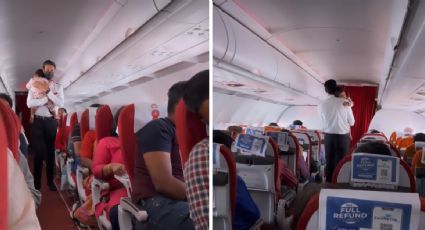 Sobrecargo calma a un bebé durante un vuelo y se vuelve viral