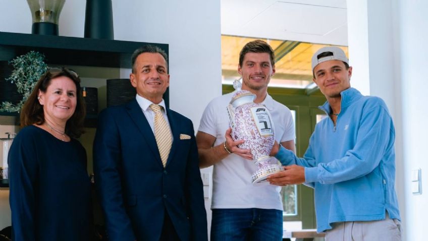 ¡Con cuidado Lando! Norris entrega a Max Verstappen un nuevo trofeo del GP de Hungría 2023