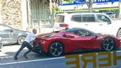 Foto ilustrativa de la nota titulada VIRAL: Un hombre es captado empujando su Ferrari en calles de Australia, ¡de no creerse!