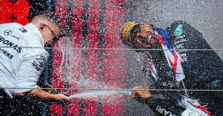 Lewis Hamilton y Bono 